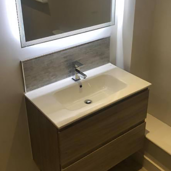 New bathroom sink and mirror in a newly built house