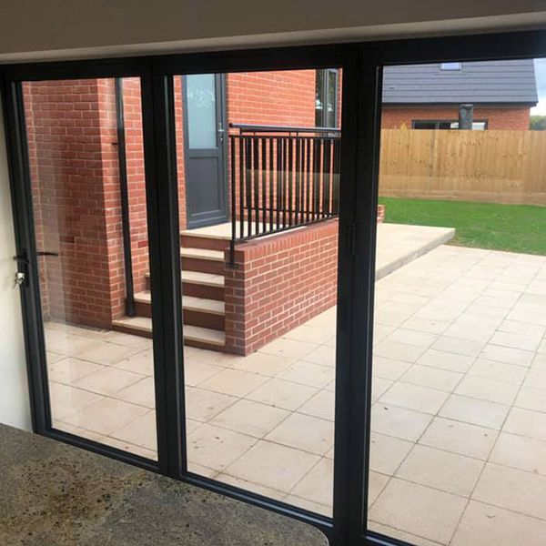 Bi-folding-doors leading from kitchen to patio