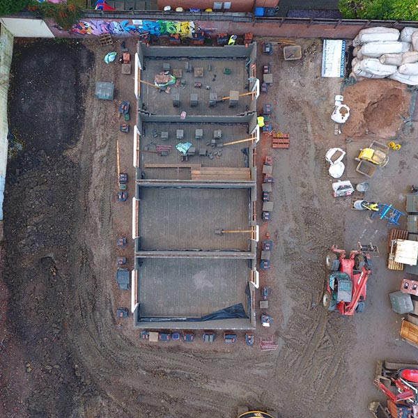 Arial view of a housing plot showing foundations